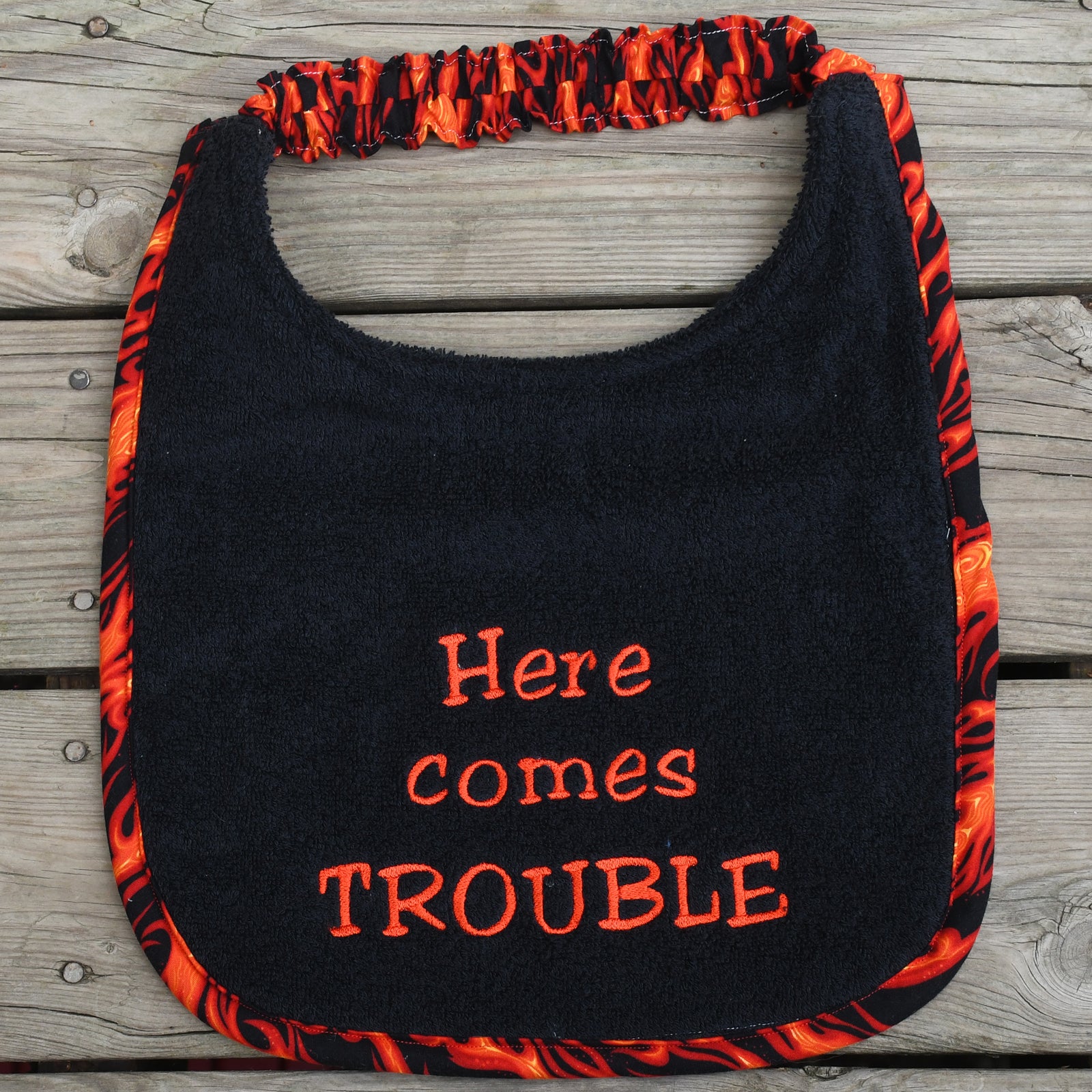 Here comes Trouble, Drool Bib