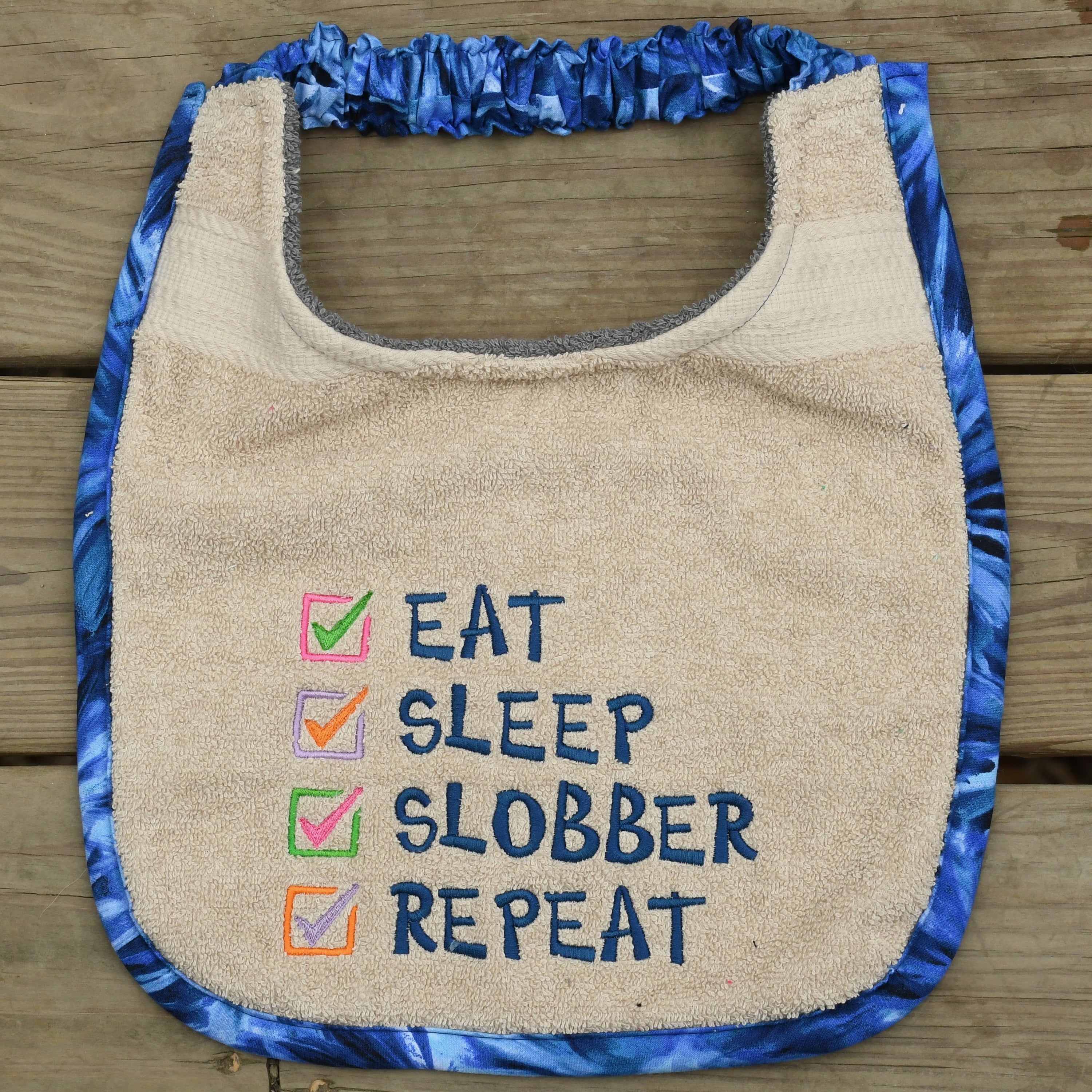 Eat, Sleep, Slobber, Repeat, Drool Bib