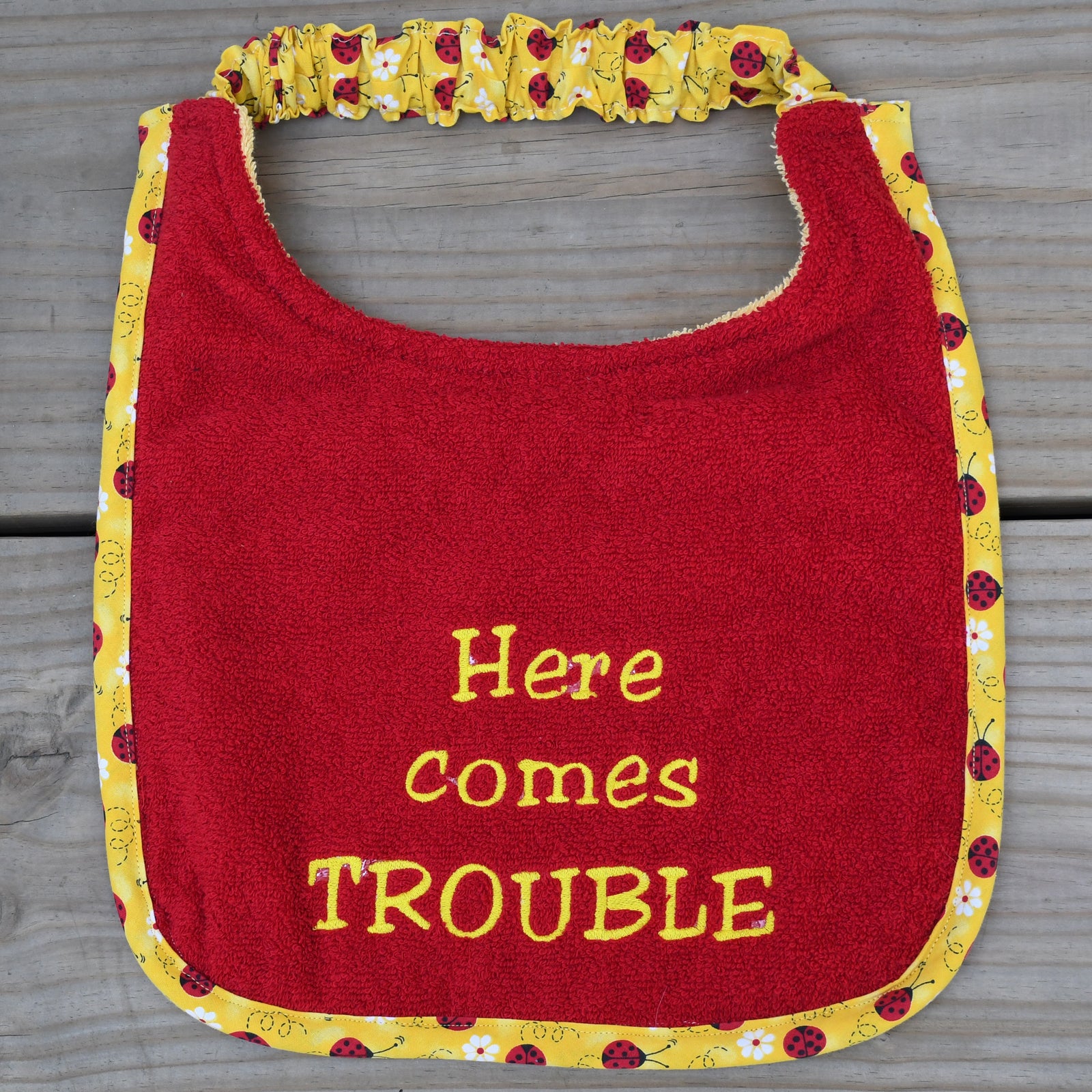 here comes trouble, Drool Bib