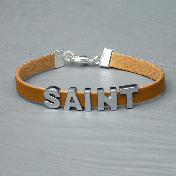 "SAINT" charm/friendship bracelet - 8 inches