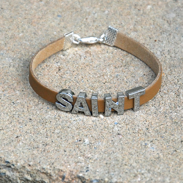 "SAINT" charm/friendship bracelet - 7.5 inches